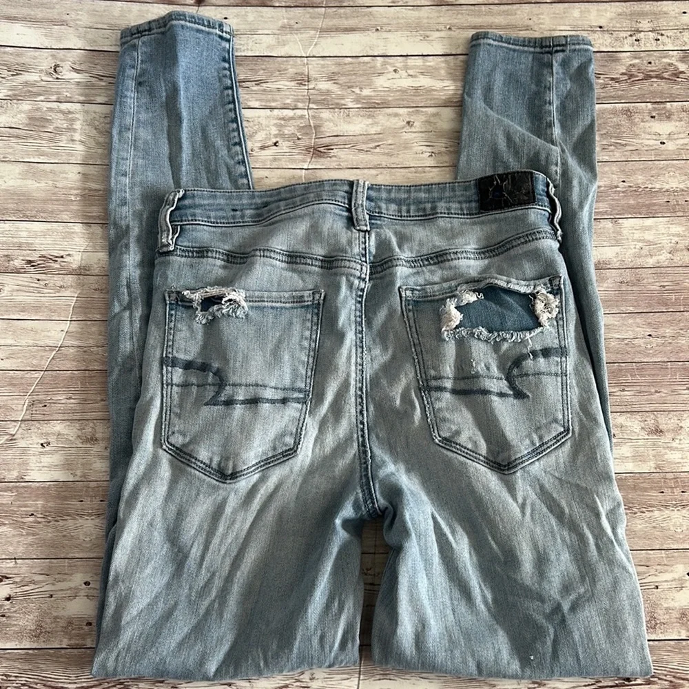 American Eagle Outfitters Light Wash Distressed Super Hi Rise Jeggings Jeans - Picture 4 of 9